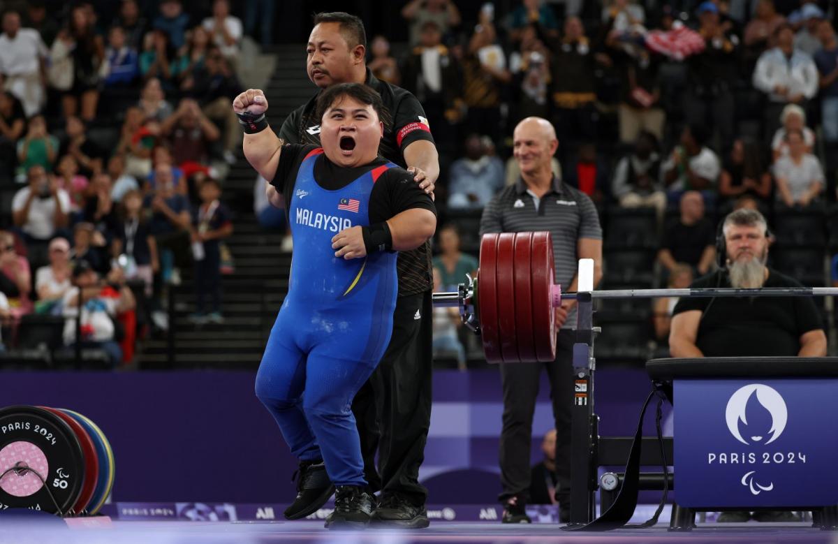 An athlete reacts with ecstacy